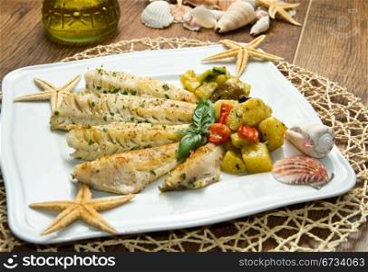 Tasty healthy fish fillet with vegetables