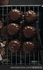 Tasty homemade chocolate cake on dark background.. Tasty homemade chocolate cake