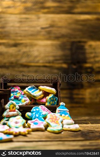 Tasty homemade Christmas cookies on wooden table