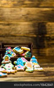 Tasty homemade Christmas cookies on wooden table