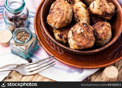 tasty homemade cutlets. Homemade cutlets in clay ware on a plate.Ukrainian food