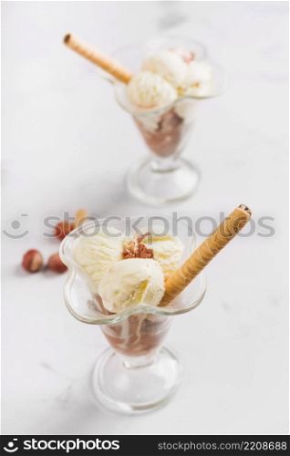 tasty ice cream scoop glass bowl nuts