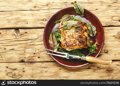 Tasty loin meat stuffed with sorrel and bacon. Meatloaf with herbs.