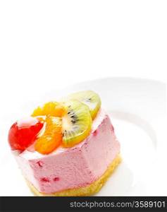 Tasty low-calorie fruit cake isolated on white background