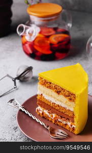 Tasty mango mousse cake on plate