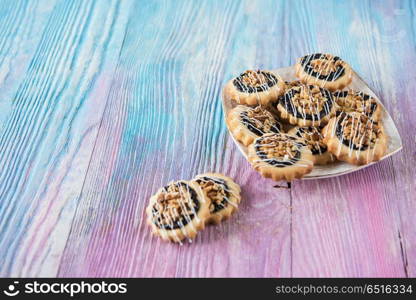 Tasty many cookies. Tasty cookies set on a color gradient background