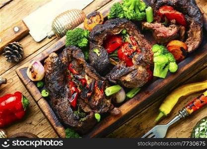 Tasty meat baked with bell pepper and broccoli.Beef roll,meatloaf.Festive christmas food. Meatloaf for the Christmas table