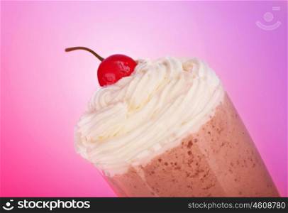 Tasty milkshake isolated on pink background, sweet vanilla icecream with red fresh cherry, cold chocolate beverage with yummy froth, refreshing fruity yogurt frozen, creamy dessert with fruit