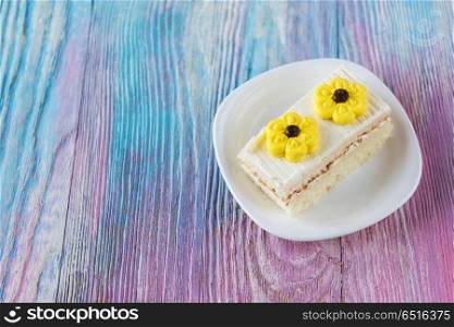 Tasty mini cake. Tasty mini cake on a color gradient background