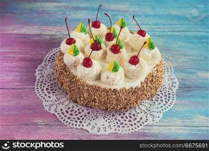 Tasty mini cake. Tasty mini cake on a color gradient background