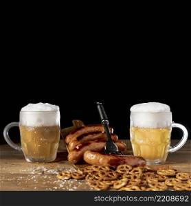tasty mugs beer with sausages table