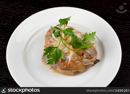 Tasty mushroom mix with cheese and cream wrapped at rice paper packet