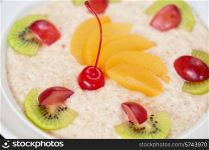 Tasty oatmeal with berries and fruits