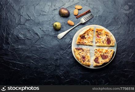 Tasty omelet with figs and almonds.Space for text. Omelet with figs and almonds,copy space