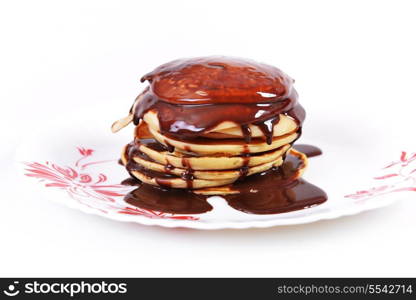 tasty pancakes with chocolate syrup