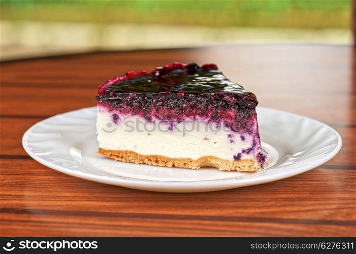 tasty piece of berry cake closeup