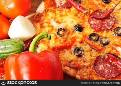 Tasty pizza and various vegetables close up