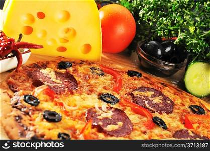 Tasty pizza , cheese and various vegetables close up