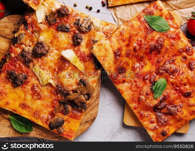 Tasty pizza on the wooden background