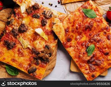 Tasty pizza on the wooden background