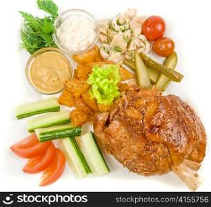Tasty pork brisket dish with vegetables on a white background
