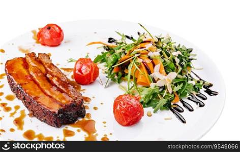 Tasty pork rib baked under sauce on plate