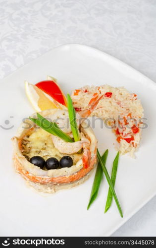 tasty prepared fish with rice and vegetables