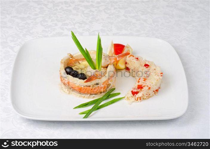 tasty prepared fish with rice and vegetables