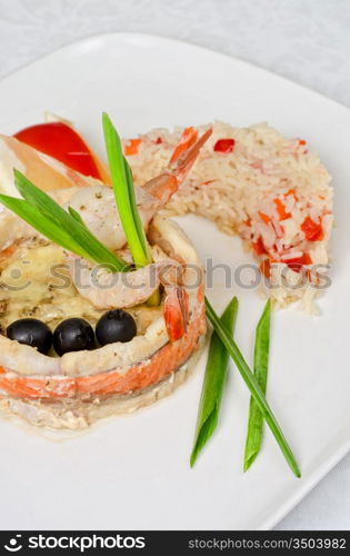 tasty prepared fish with rice and vegetables