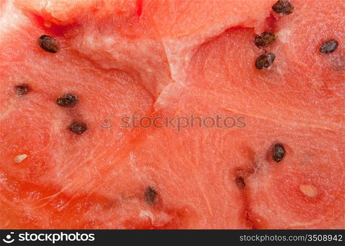 Tasty pulp of watermelon with many seeds