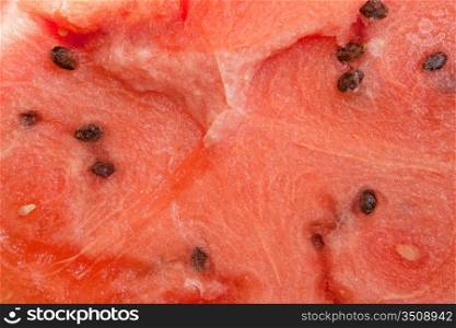 Tasty pulp of watermelon with many seeds