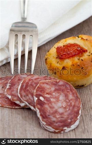 Tasty rustic italian bread with salami