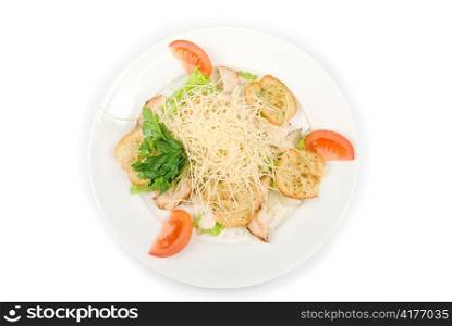 Tasty Salad dish with dried crust, vegetables, greens and cheese on a white background