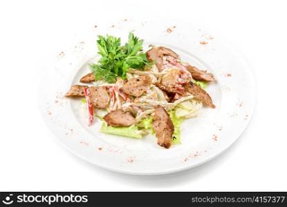 Tasty salad of meat and vegetable dish close up