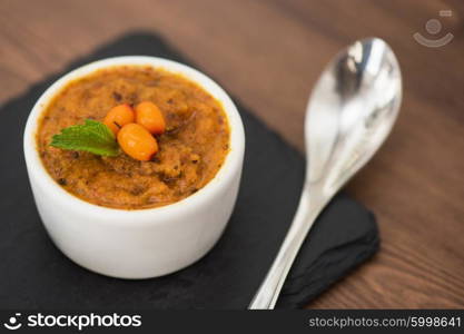 tasty seabuckthorn sorbet jam. seabuckthorn sorbet jam on the table