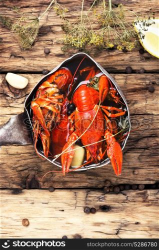tasty seafood shellfish served in metal pot. boiled shellfish in pan