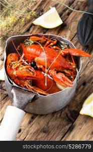 tasty seafood shellfish served in metal pot. shellfish in the pan