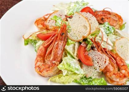 Tasty shrimp salad. Tasty shrimp salad with vegetables on christmas table