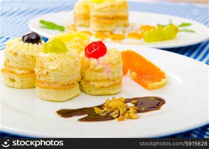 Tasty sweets in the plate