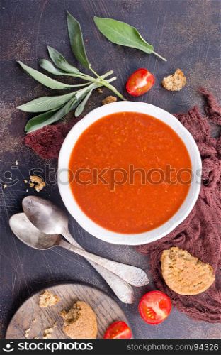 Tasty tomato soup with aroma spice and herbs