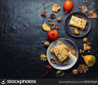 Tasty traditional autumn pie. Sweet pumpkin cake on a plate. Delicious pumpkin pie