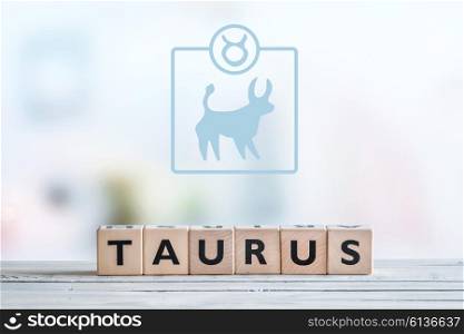 Taurus star sign on a wooden table
