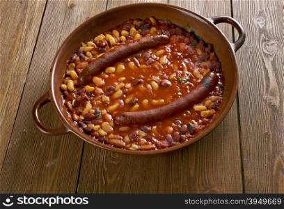 Tavche gravche traditional Macedonian dish.Baked beans with sausage