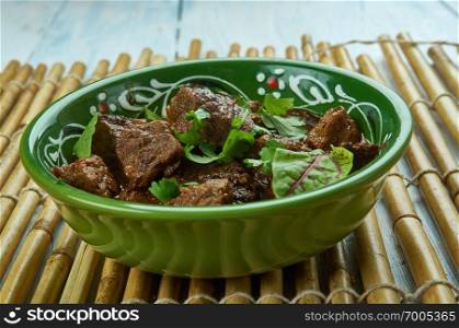 Tawa mutton - Pakistani pan put mutton, chopped onion, ginger garlic paste, chopped tomatoes.