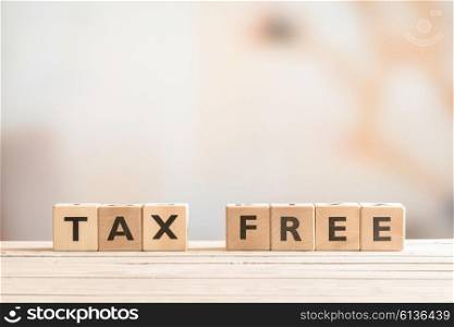 Tax free sign made of wood on a table