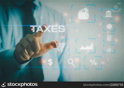 Tax payment concept. Businessman touching tax financial virtual button.payment by corporations such as VAT, income tax.