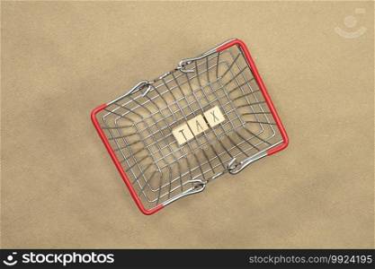 Tax written with wooden cubes top view in shopping basket with money coins and bills on the background. Business and financial concept Copy space. Tax written with wooden cubes top view in shopping basket with money coins and bills on the background. Business and financial concept