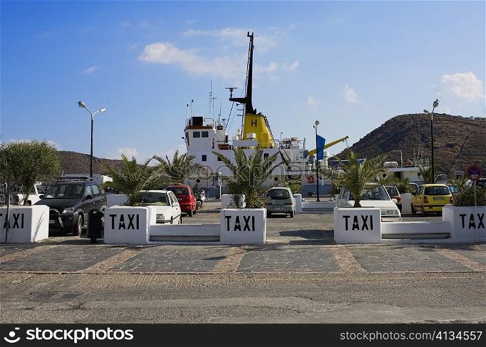 Taxi at a taxi stand in a city, Patmos, Dodecanese Islands, Greece