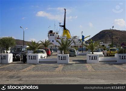 Taxi at a taxi stand in a city, Patmos, Dodecanese Islands, Greece