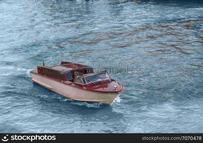 taxi boat on the canal in venice